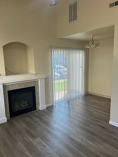 DINING ROOM WITH SLIDING GLASS DOOR TO PATIO AND STORAGE