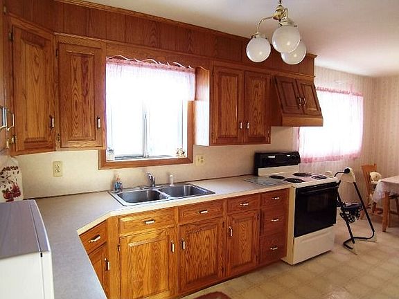 Attractive oak cabinetry defines the kitchen