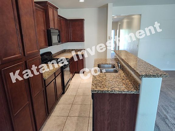 5th image of 42490 W Arvada Ln