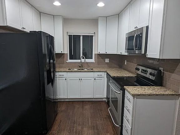 4th image of 8560 Cedar Ln