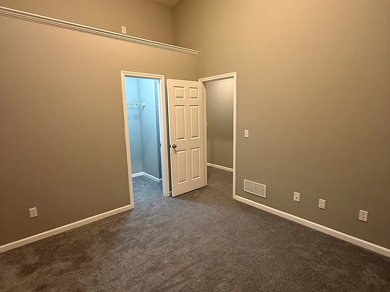 Third bedroom with walk-in closet.
