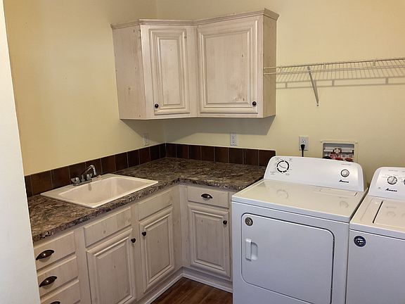 Laundry room to the right entering from the side door.