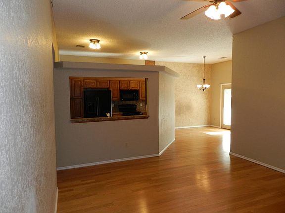 living room looking to kitchen