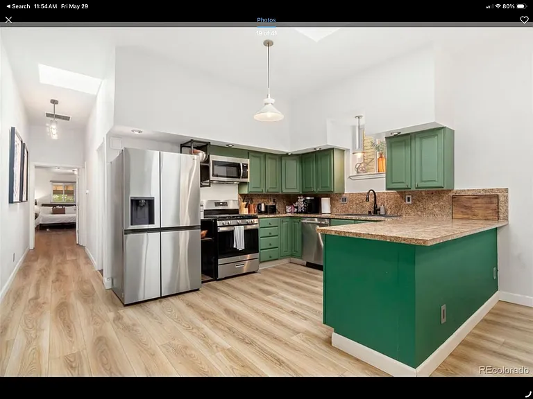 2421 Tremont Pl — Photo 5