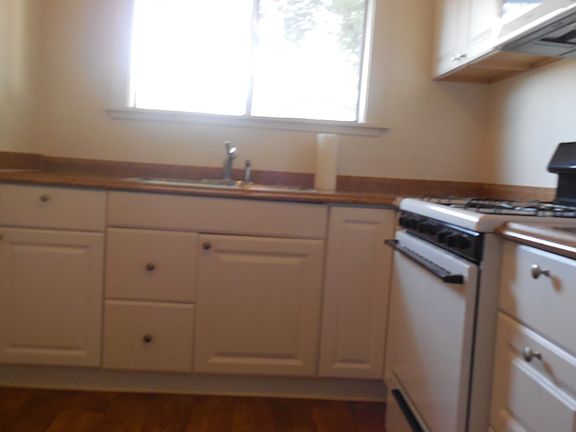 Kitchen includes refrigerator