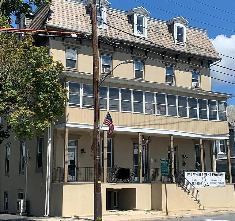 103 E Main St #302