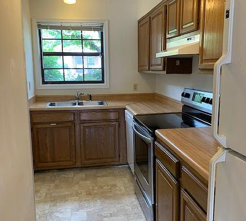 Kitchen has good counter and cabinet space.