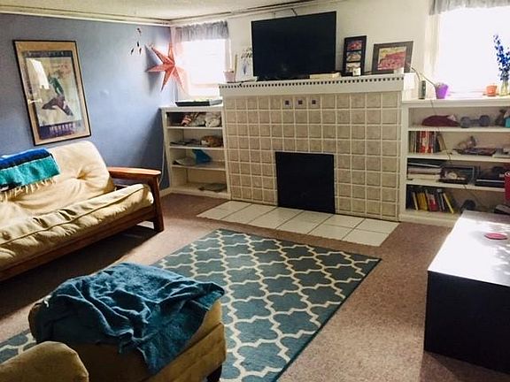 Garden Level Living Room with built-in bookcases