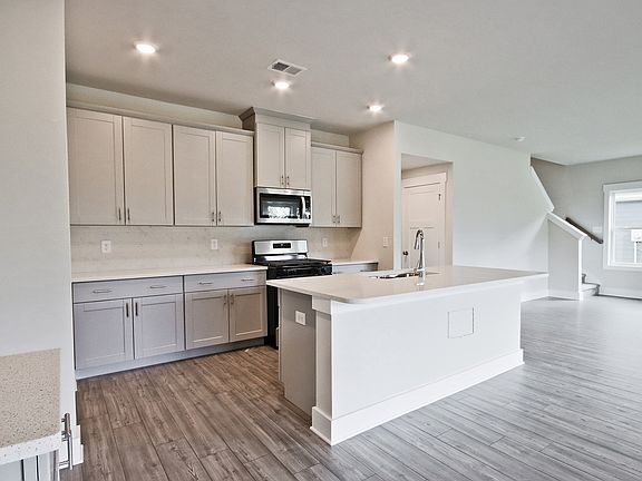 Enjoy your morning coffee at the stunning kitchen island.