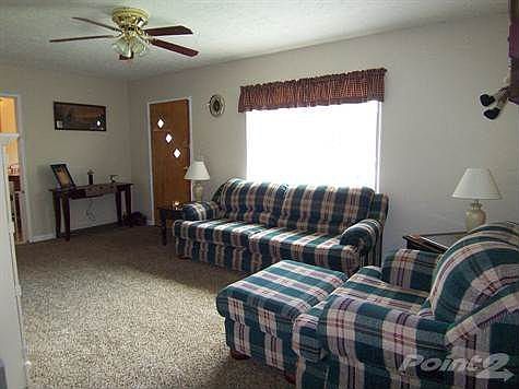 Freshly painted, hardwood flooring under carpet.
