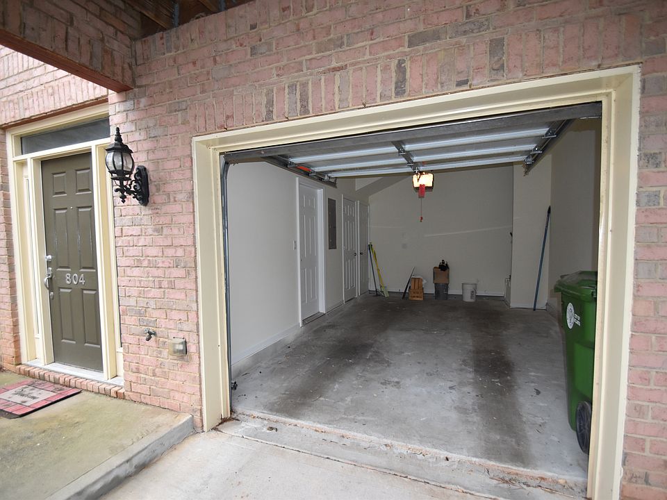 1 Car garage with unfinished storage, and 1 car driveway