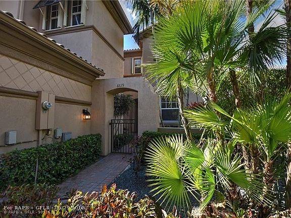 Gated entrance to courtyard in front of the home.