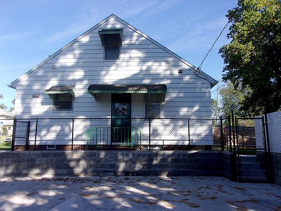 Beautiful Fenced-In Yard with Large Concrete Driveway