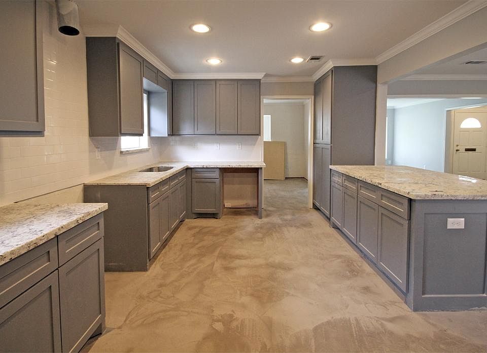 Beautiful new kitchen in this Timbergrove Manor remodel. Custom cabinets, granite counter tops, stai