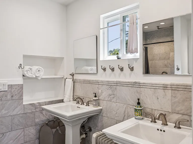 Upstairs marble bathroom