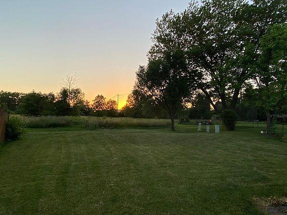 Peaceful backyard with sunset view