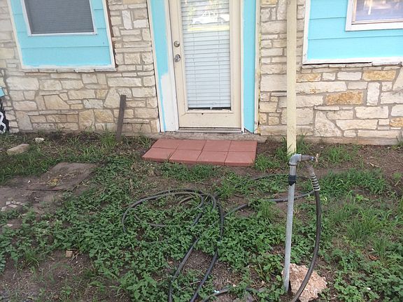 Outside the master bedroom to the fron yard