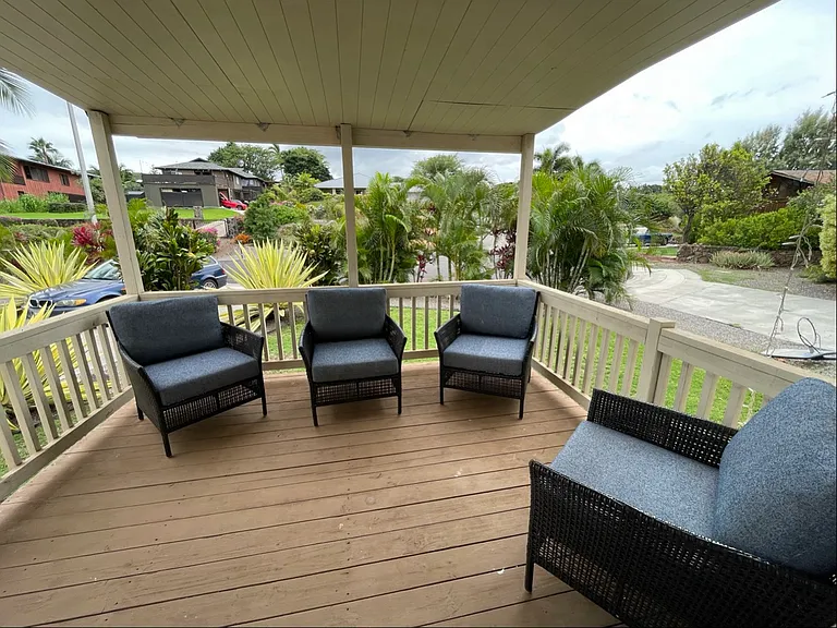 Front lanai with seating - enters to the main bedroom