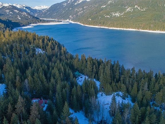 Approximately 400' thru the USFS is Lake Kachess! Pristine mountain lake, about 1 mile wide & 12 miles long, accompanies motors, great fishing too! Kachess Ridge Community also has a waterfront parcel for members to enjoy. It is gated, with parking space and a trail to carry your kayak down! Launch your boat at the nearby Campground.