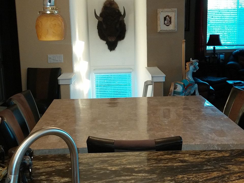 Kitchen looking at dining area and entrance