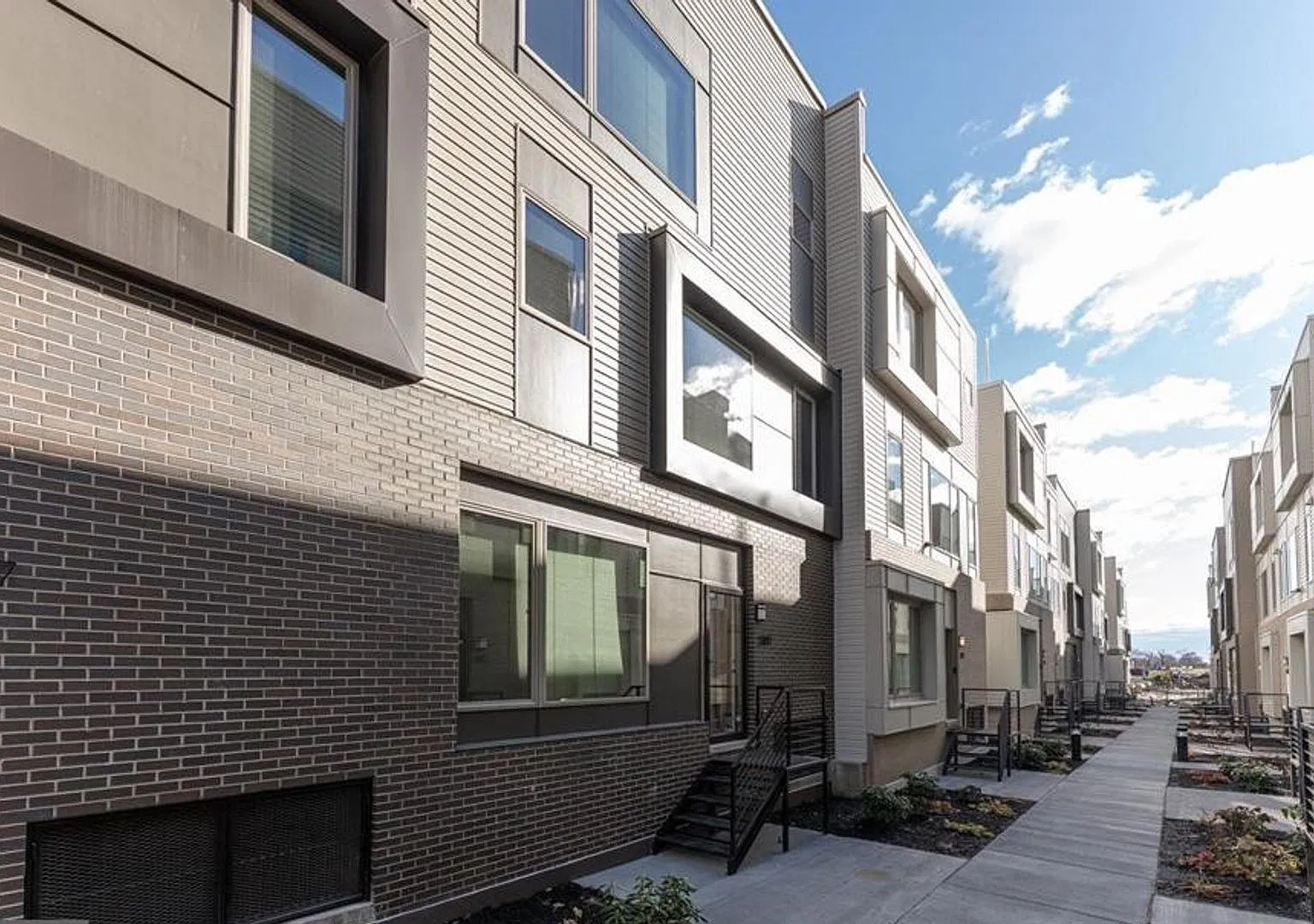 Gorgeous 3-Bedroom Townhome with Parking Spot! Finished Basement and Roof Deck! — Photo 1