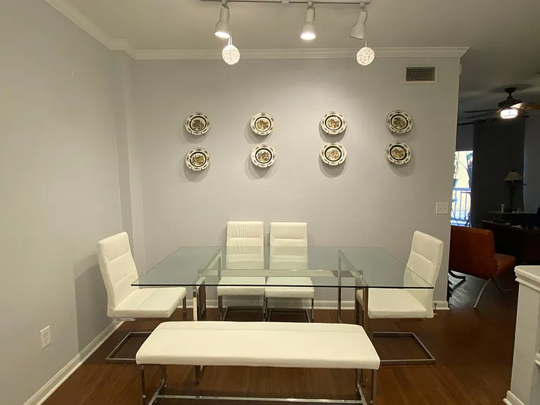 6 Seat Glass Top Table, to enjoy dinner with friends. I can leave it here, or if you prefer, I will take it out.