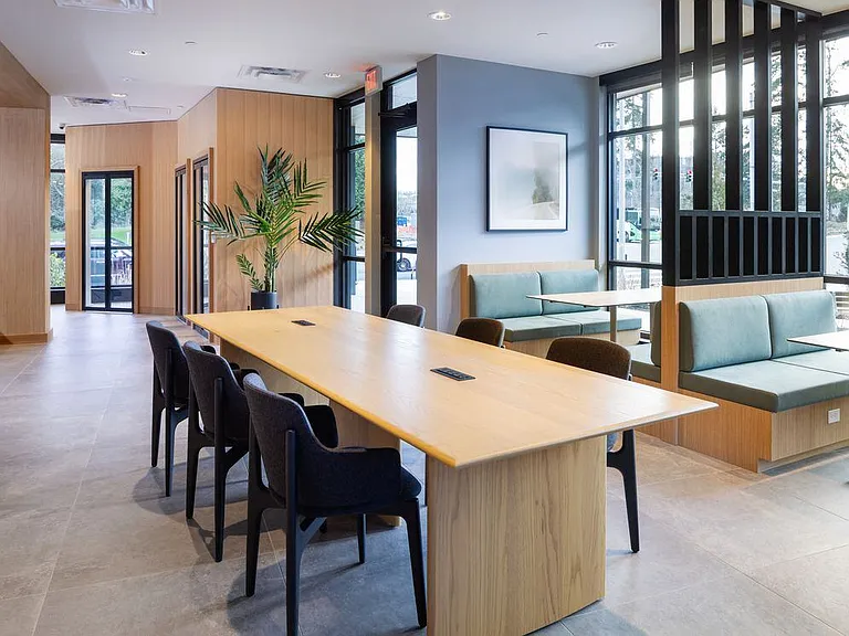 Co-working lounge with multiple seating areas
