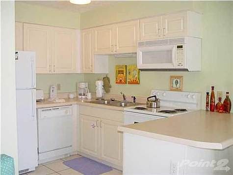 Kitchen with bar.