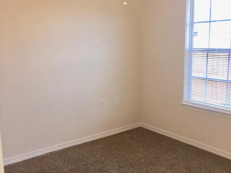 Third bedroom with Fan and large window