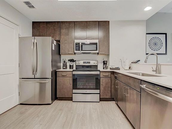 2nd image of 14501 GROVE RESORT AVENUE #3706