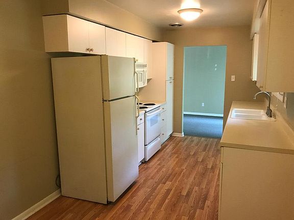 Not shown are new cupboards, hardware, and GRANITE countertops.