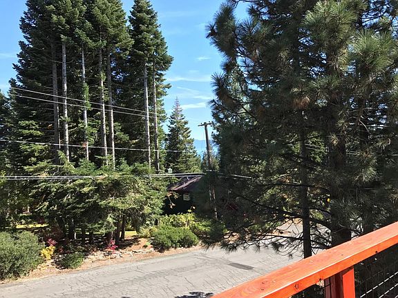 sunny south facing deck with lake view