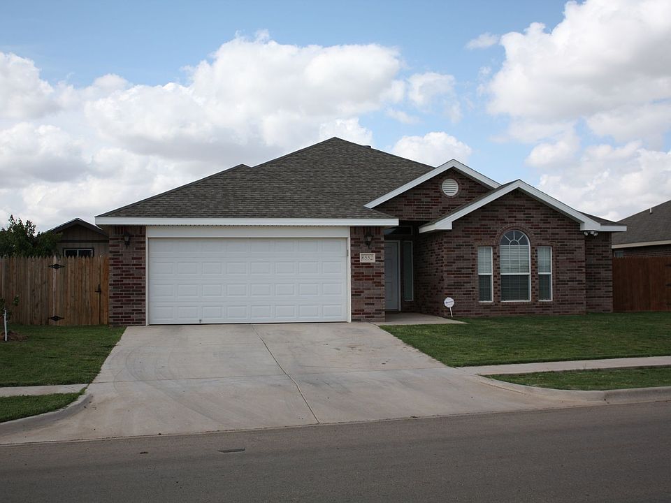 House front, can see the top of the shed on the left in  the backyard
