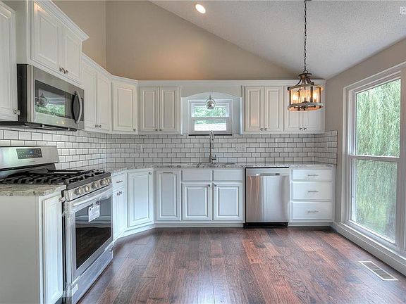 Remodeled kitchen with custom backspash