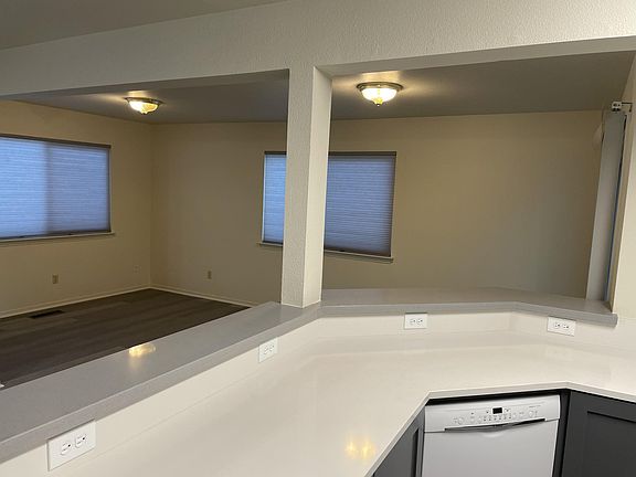 Living room adjacent to kitchen.