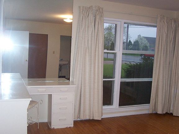 Masterbedroom with built-in vanity and half bath