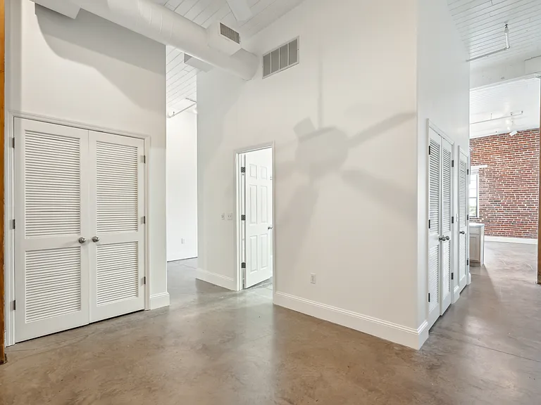 Concrete Floors, 10ft+ Ceilings, Exposed Brick