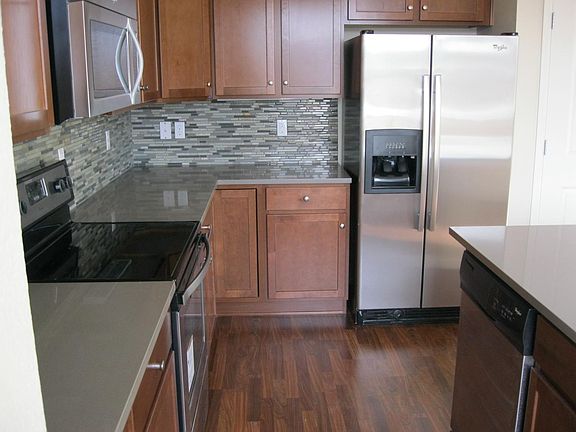 quartz countertops, tile backsplash