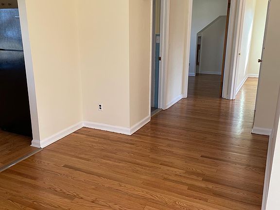 Entrance - bedrooms are to the right of bathroom, kitchen, living room and dining room are to the left as you enter the apartment.