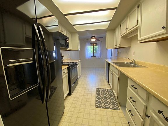 Eat-In Kitchen includes refrigerator and built-in microwave. Plus a lot of cabinet storage!