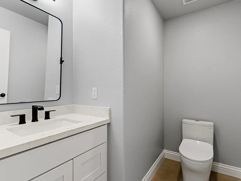 1/2 Bath off of Kitchen