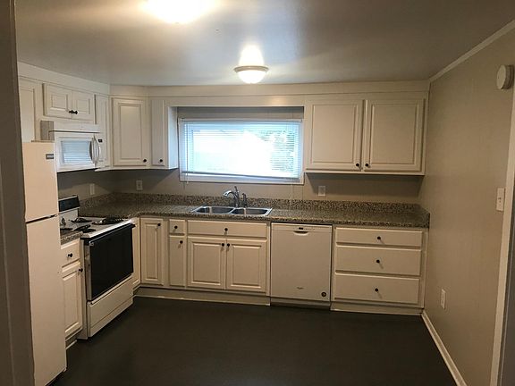New renovation of kitchen including new appliances and new custom cabinets: new dishwasher, new dispose-all, new range/stove, new microwave and refrigerator