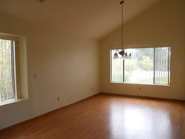 Entry view to dining room - cleared - kitchen is also on the right (hidden)