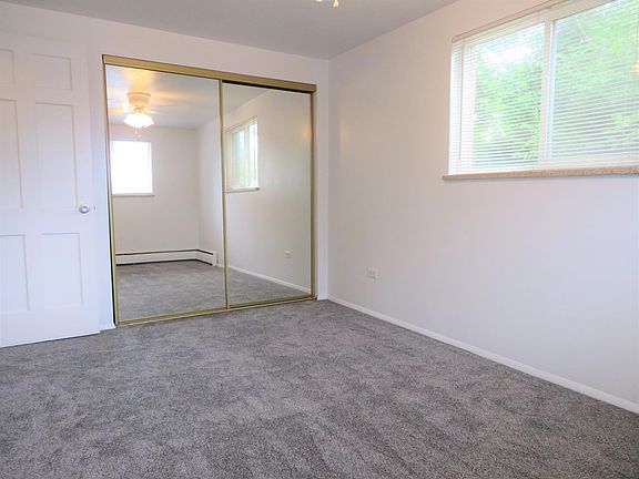 Bedroom #1 showing Mirrored Closet Doors