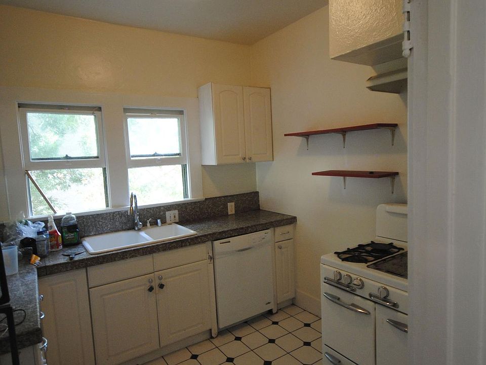 Italian tile floor. Classic 1950s gas stove- maintain it or replace with yours.