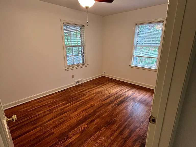 Front bedroom with fan.