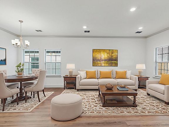 Dinning Area and Family Room. (virtually staged)