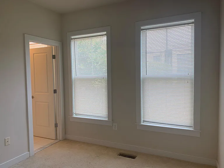Third-floor bedroom with a connected bathroom.