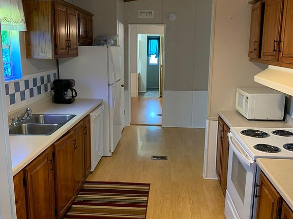 Galley Kitchen, small Dining Room on Right
Stove, Refrigerator and dishwasher stay