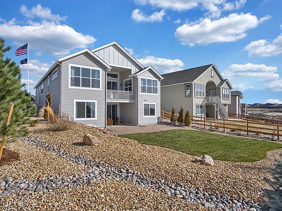 Rear on Walk-Out Photo representing home to be built and may demonstrate optional features